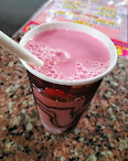 Close-up of a rose milk glass